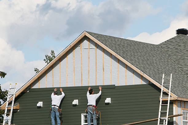 Professional Siding Replacement technician working in Simpson, PA